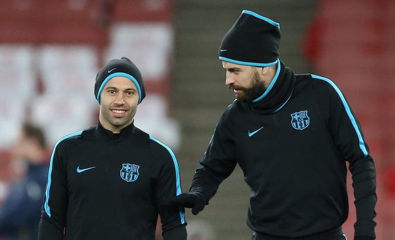 Football Soccer - FC Barcelona Training - Emirates Stadium, London, England - 22/2/16Barcelona's Javier Mascherano and Gerard Pique during trainingAction Images via Reuters / Matthew ChildsLivepicEDITORIAL USE ONLY.