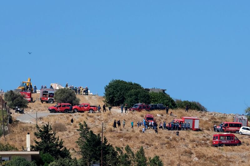 Firefighters get to work after the earthquake in Arkalochori village on the southern island of Crete. Photo: AP