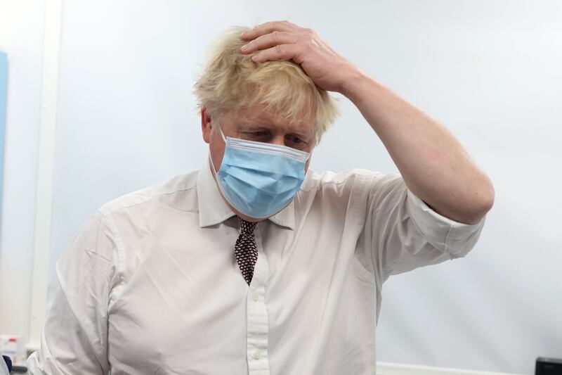 Mr Johnson looks as if he is feeling the pressure on a visit to Finchley Memorial Hospital in London. Getty Images