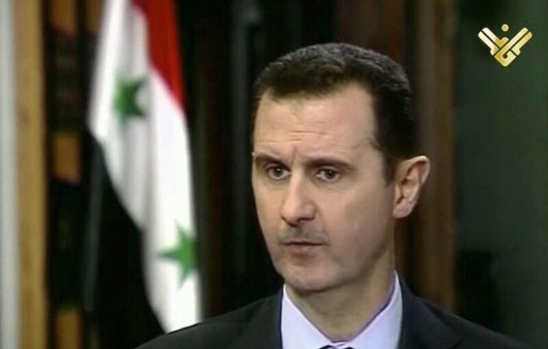 This image made from video shows Syrian President Bashar Assad during an interview broadcast on Al-Manar Television on Thursday, May 30, 2013. Syrian President Bashar Assad on Thursday was quoted as saying his regime has received from Russia a first shipment of sophisticated anti-aircraft missiles — game-changing weapons that are bound to further raise regional tension, particularly with Israel whose defense chief has called them a threat. Assad made the comments about the arrival of the long-range S-300 air defense missiles in an interview with Lebanon's Hezbollah-owned TV station Al-Manar, to be aired later Thursday. The station sent the remarks to journalists in a text message ahead of the broadcast and confirmed them in a phone call. (AP Photo/Al-Manar Television via AP video) *** Local Caption ***  Mideast Syria.JPEG-0037f.jpg