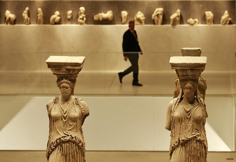 The famous Caryatid statues at the new Acropolis museum. AFP Photo / Pool / John Kolesidis 