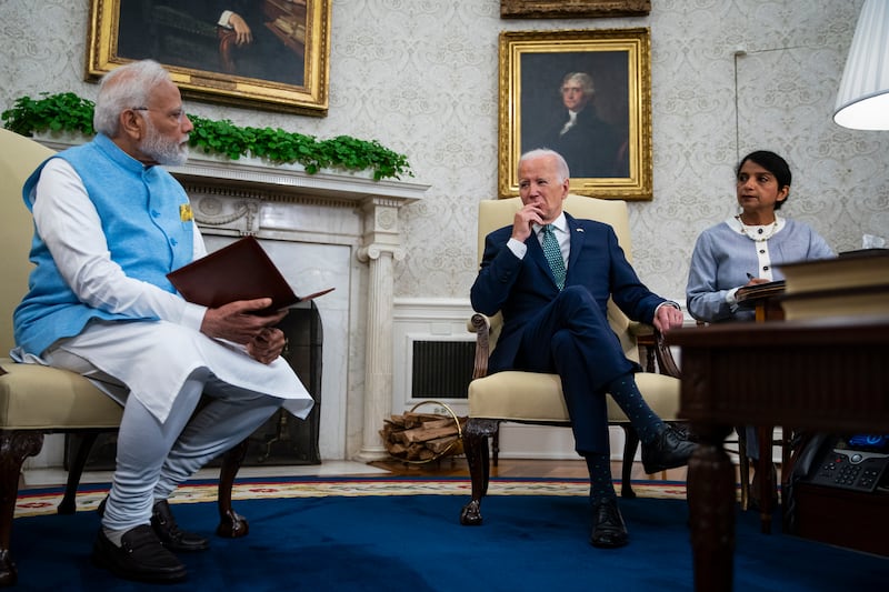Mr Biden and Mr Modi speak in the Oval Office of the White House. EPA