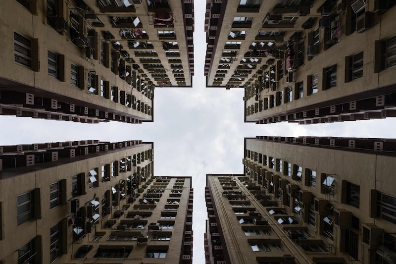 A group of residential buildings is seen in Hong Kong on September 27, 2018. Two of Hong Kong's biggest banks raised their lending rates on September 27 for the first time in 12 years, ending an age of cheap cash that could hit the city's famously red-hot property market.
 / AFP / Anthony WALLACE
