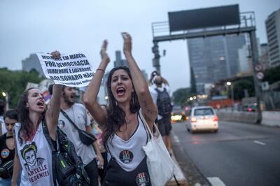 SAO PAULO, BRAZIL - SEPTEMBER 29: Women protest against the far-rights presidential candidate on September 29, 2018 in Sao Paulo, Brazil. The protests occurred simultaneously in several Brazilian cities, against Jair Bolsonaro, the far rights presidential candidate. Protests included an internet campaign (#elenão and #himnot) which was joined by many women from various countries. Corinthians fans, Brazil's biggest soccer team, and other social groups also joined. (Photo by Victor Moriyama/Getty Images)