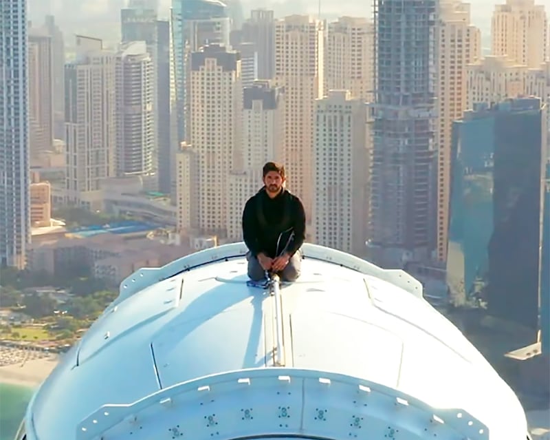 Sheikh Hamdan bin Mohammed, Crown Prince of Dubai, kneels on top of Ain Dubai. Photo: Screengrab