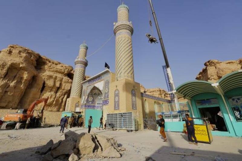 The shrine, which is revered by Shiites, partially collapsed when it was hit by the landslide. Getty
