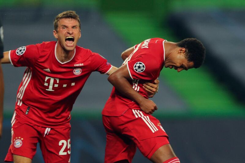 Bayern's Serge Gnabry, right, celebrates his side's second goal with his teammate Thomas Mueller. AP
