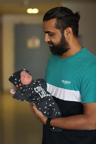 Shahmeer was born to a Pakistani couple, Saba Irfan and Irfan Khan, just after midnight in Abu Dhabi. He is pictured with his father. Photo: Burjeel Hospital