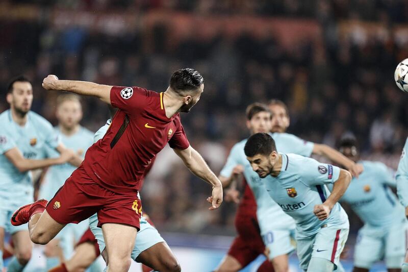 Roma's Kostas Manolas scores against Barcelona during their Uefa Champions League quarter-final second-leg match in Rome. Riccardo Antimiani / EPA