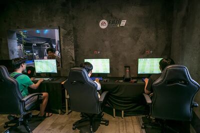 Gamers play the FIFA Online 4 game, developed by Electronic Arts Inc. (EA), during SK Telecom Co.'s 5GX Game Festival in Goyang, South Korea, on Friday, Aug. 10, 2018. Professional video gaming began in South Korea more than a decade ago, and has given rise to leagues that now pack stadiums and draw hundreds of thousands of eyeballs to Twitch livestreams for tournaments. Photographer: Jean Chung/Bloomberg