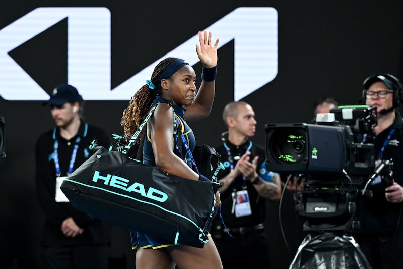 American teenager Coco Gauff waves to the crowd after the match. EPA