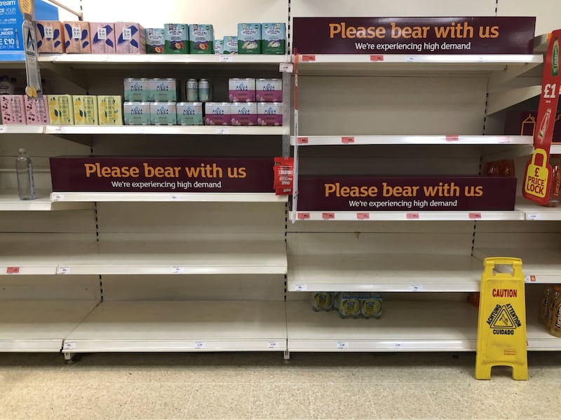 Empty shelves in the soft drinks aisle of a Sainsbury's store in Rowley Regis in the West Midlands, England. AP