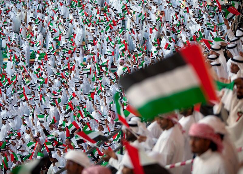 People join in celebration of the 40th Anniversary of the creation of the United Arab Emirates as they gather for a program of military and artistic parade on Friday afternoon, Dec. 2, 2011, at the Zayed Sports City in Abu Dhabi. (Silvia Razgova/The National)
