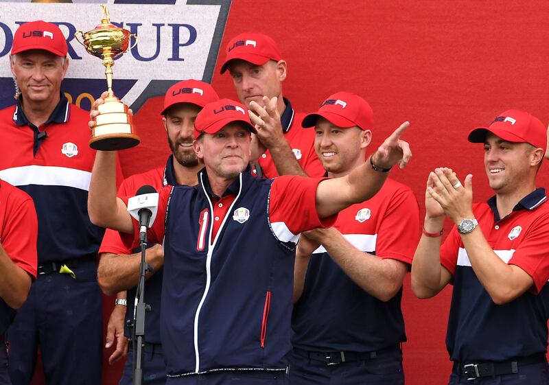 USA captain Steve Stricker celebrates with his team and the Ryder Cup trophy after victory against Europe at Whistling Straits, Wisconsin, in September. PA