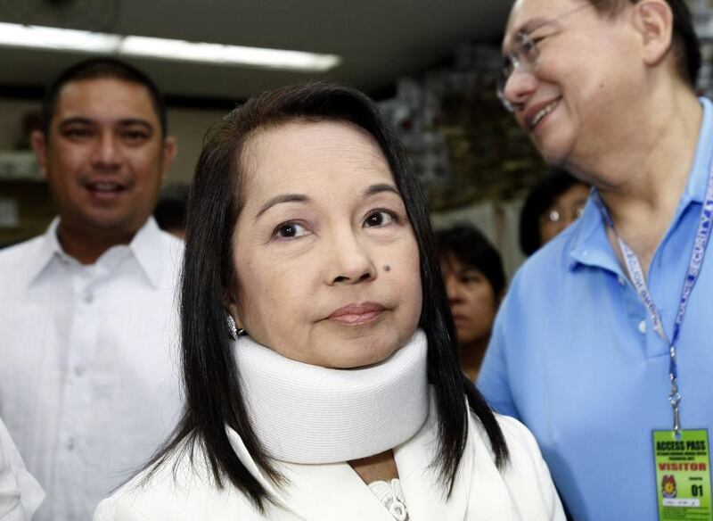 Gloria Arroyo, centre, has been held under hospital arrest since November 2011. Bullit Marquez / AP Photo File 2012