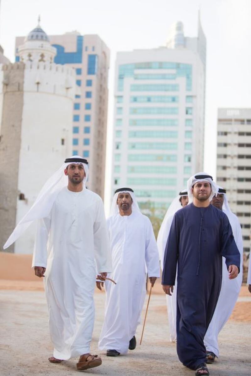 Mohammed Mubarak Al Mazrouei, Under-Secretary of the Crown Prince Court of Abu Dhabi (L), Saeed Eid Al Ghafli, Chairman of the Department of Municipal Affairs and Abu Dhabi Executive Council member (C), Dr Ahmed Mubarak Al Mazrouei, Chairman of the Abu Dhabi Water and Electricity Authority (ADWEA) and Secretary-General of the Abu Dhabi Executive Council (R), visit Qasr Al Hosn fort. Silvia Razgova / Crown Prince Court - Abu Dhabi