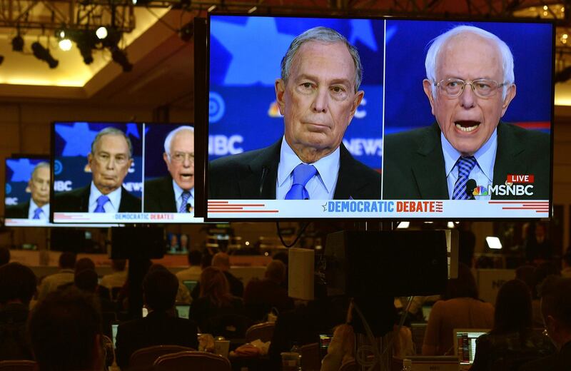 Former New York City Mayor Mike Bloomberg and Senator Bernie Sanders are seen on video screens in the media filing center during the ninth Democratic 2020 U.S. Presidential candidates debate at the Paris Theater in Las Vegas, Nevada, U.S., February 19, 2020. REUTERS/David Becker TPX IMAGES OF THE DAY