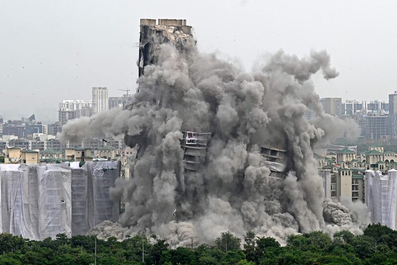 On Sunday, the crack of thousands of kilograms of explosives that rang across Noida, a satellite city of New Delhi, brought an end to one of India’s most notorious property scandals and reduced two illegal 100-metre-high residential towers to rubble. Photo: AFP