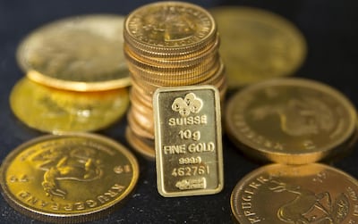 FILE PHOTO: Gold bullion is displayed at Hatton Garden Metals precious metal dealers in London, Britain July 21, 2015. REUTERS/Neil Hall/File Photo