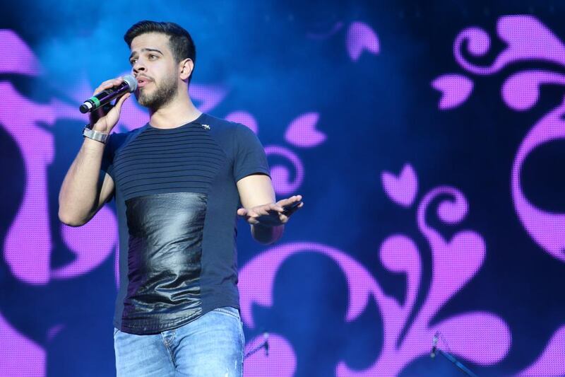 Adham Nabulsi, whose fame has exploded since his X-Factor audition, performs for a receptive crowd at Beats on the Beach. Navin Khianey for The National