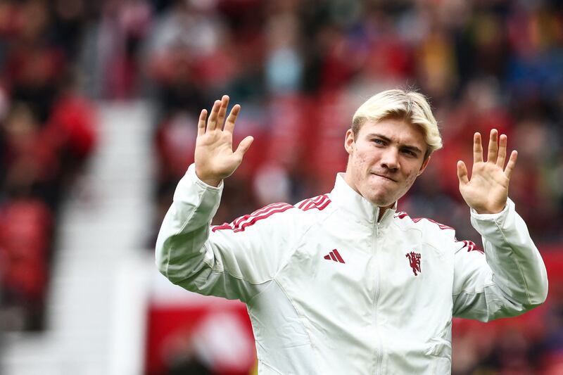 Manchester United's new Danish forward Rasmus Hojlund is introduced to the crowd at Old Trafford after completing is  £72m signing before the pre-season friendly against Lens on August 5, 2023. AFP