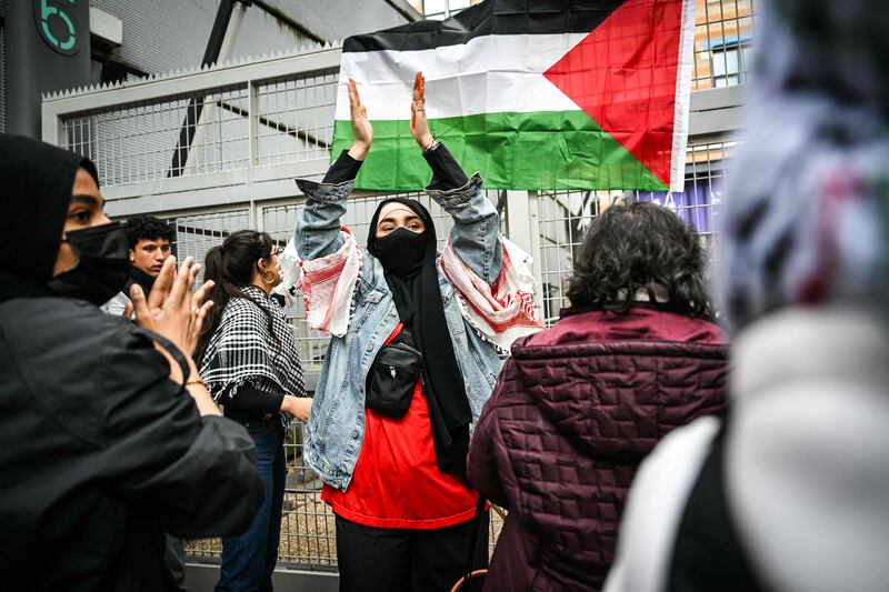 Protesters shout slogans during a pro-Palestinian demonstration in front of Jean Moulin University in Lyon, France. AFP