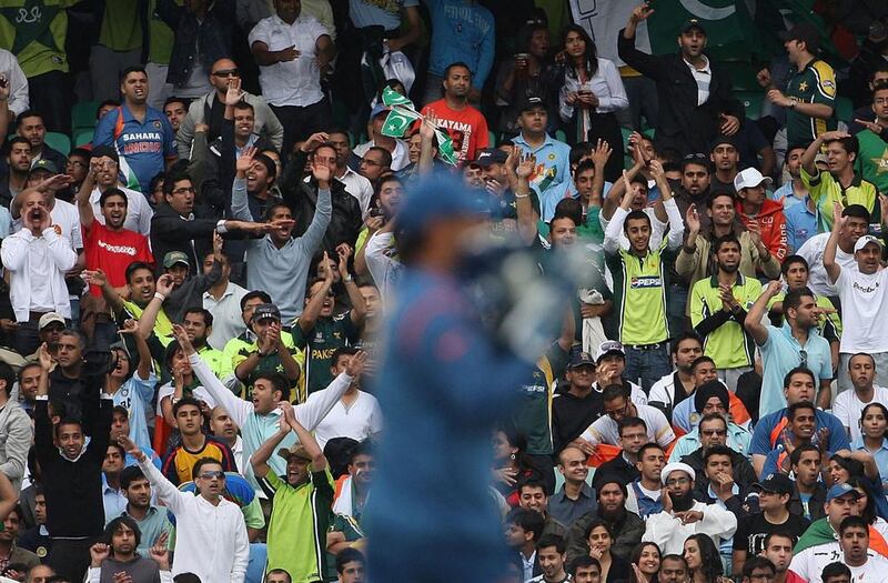 Pakistan and India fans watch a match between the sides at The Oval in England in 2009. Hamish Blair / Getty Images / June 3, 2009