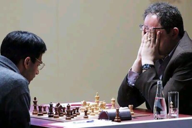 Boris Gelfand of Israel (R) and Viswanathan Anand of India (L) play their second game of the FIDE Chess World championship match in Moscow on Saturday.