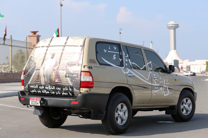 A car decorated to celebrate National Day. Khushnum Bhandari / The National