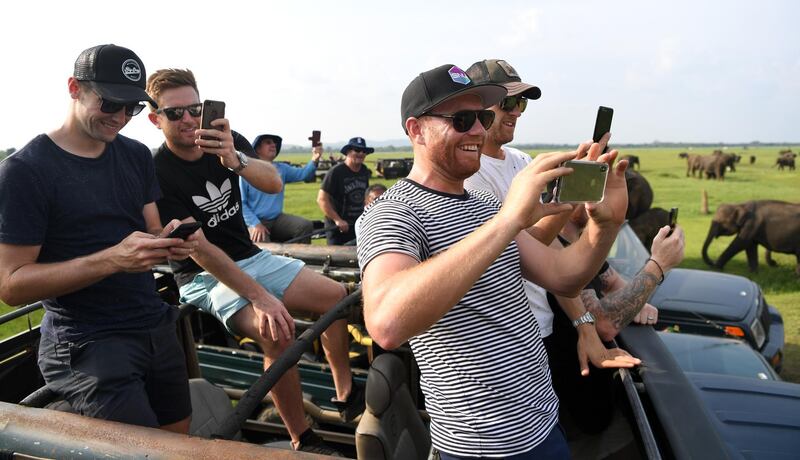 Liam Dawson, Ben Stokes, Olly Stone, Chris Woakes and Jonathan Bairstow of England take part in an elephant safari at Kaudulla National Park in Dambulla. Getty Images