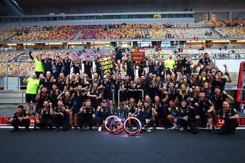 Max Verstappen and Sergio Perez celebrate with Red Bull team team in Shanghai. Getty Images