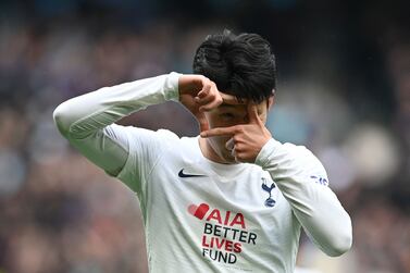 Tottenham Hotspur's South Korean striker Son Heung-Min celebrates after scoring his team third goal during the English Premier League football match between Tottenham Hotspur and Leicester City at Tottenham Hotspur Stadium in London, on May 1, 2022.  (Photo by Glyn KIRK / AFP) / RESTRICTED TO EDITORIAL USE.  No use with unauthorized audio, video, data, fixture lists, club/league logos or 'live' services.  Online in-match use limited to 120 images.  An additional 40 images may be used in extra time.  No video emulation.  Social media in-match use limited to 120 images.  An additional 40 images may be used in extra time.  No use in betting publications, games or single club/league/player publications.   /  