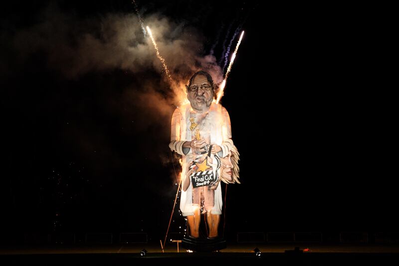 EDENBRIDGE, ENGLAND - NOVEMBER 04: An effigy of film producer Harvey Weinstein is burned during a fireworks display at Edenbridge Bonfire Night on November 4, 2017 in Edenbridge, England. Each year the Edenbridge Bonfire Society creates a 'Celebrity Guy' effigy of an infamous public figure which is burnt during the annual bonfire night celebrations. (Photo by Jack Taylor/Getty Images)