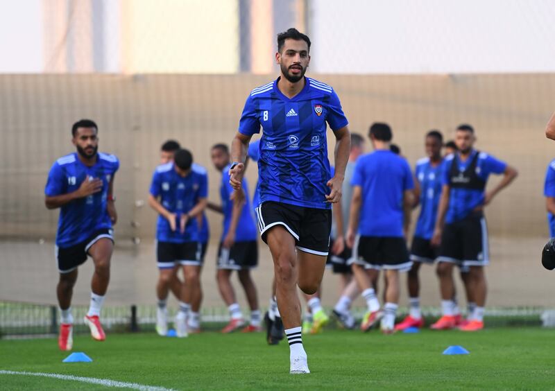 Majed Hassan runs during a UAE training session.