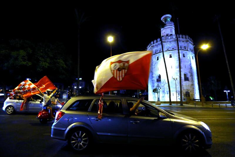 Sevilla fans celebrate in Seville. Reuters