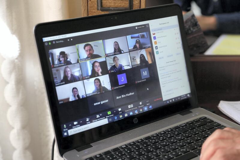 DUBAI, UNITED ARAB EMIRATES , March 22 – 2020 :- Zack Stewart , Grade 12 teacher at the Dubai American Academy taking online class from his home in the Springs in Dubai. Today is the first day of distance learning as all the schools are closed as a preventive measure against coronavirus. (Pawan Singh / The National) For News/Online/Instagram. Story by Sarwat Nasir