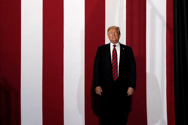 U.S. President Donald Trump takes the stage during a campaign rally in Springfield, Missouri, U.S., September 21, 2018. Picture taken September 21, 2018.  REUTERS/Mike Segar      TPX IMAGES OF THE DAY