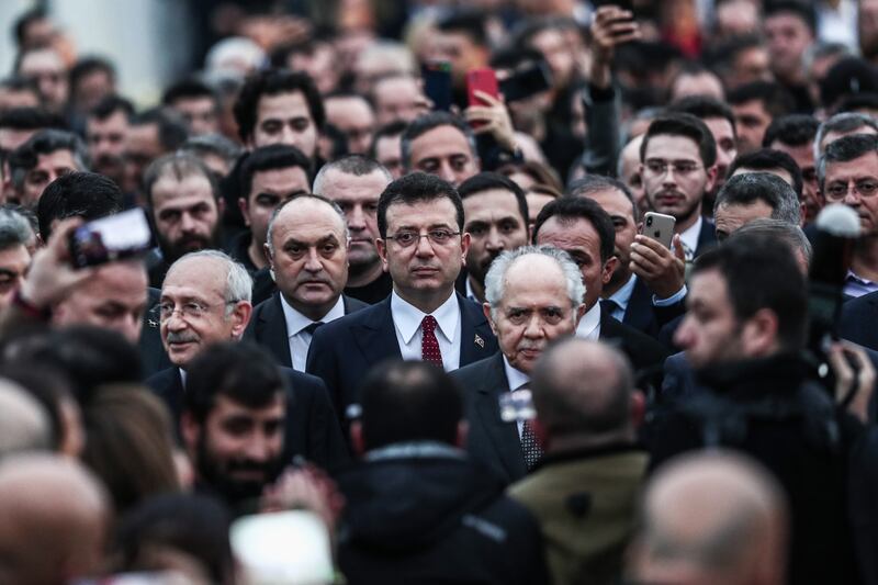 Mr Kilicdaroglu, centre-left, and Mr Imamoglu, centre, at the rally. EPA