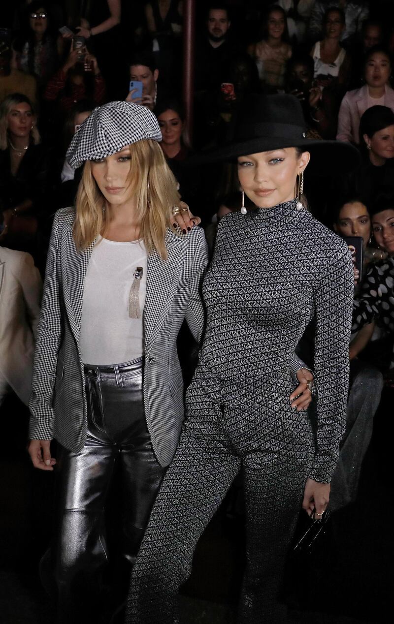 epa07829240 US fashion models Bella (L) and Gigi Hadid (R) pose for photographers before the Tommy Hilfiger fashion show during New York Fashion Week in New York, New York, USA, 08 September 2019. New York Fashion Week shows for designer's Spring and Summer lines are being held from 05 to 11 September 2019.  EPA-EFE/PETER FOLEY