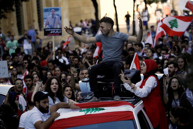 Protesters chant slogans as they march at a demonstration organised by students during ongoing anti-government protests in Beirut on November 12, 2019. Reuters