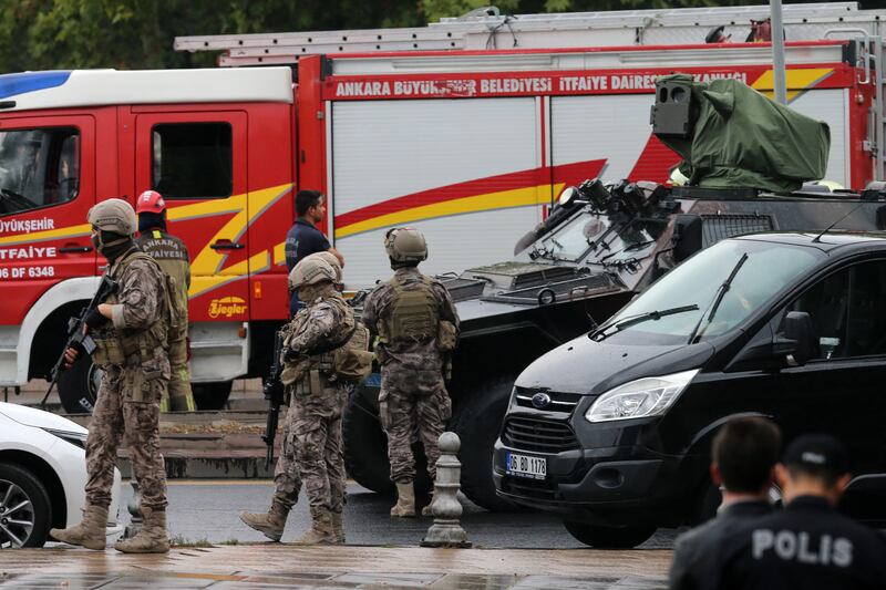 Soldiers, fire engines and armoured vehicles gathered at the ministry near the centre of Turkey's capital. EPA
