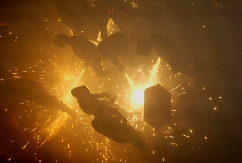 Revellers play with fireworks during the annual Corda festival in the village of Paterna near Valencia, Spain. Heino Kalis / Reuters