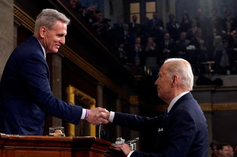 President Joe Biden shakes hands with House Speaker Kevin McCarthy after the State of the Union on February 7 in Washington.  Reuters