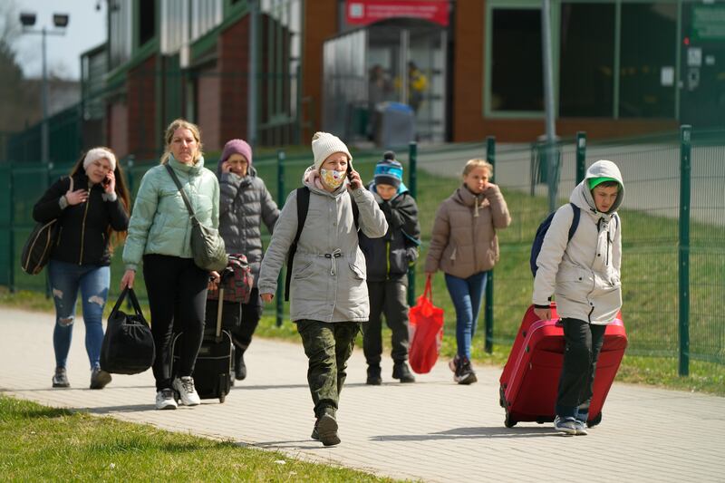 Refugees at the border crossing in Medyka, Poland, a country which has to date taken in more than 2,825,000 people from Ukraine. AP Photo