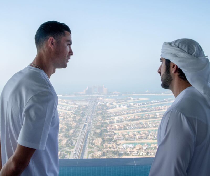 Sheikh Hamdan bin Mohammed, Crown Prince of Dubai, right, with Cristiano Ronaldo at SushiSamba in Dubai. Photo: Instagram @faz3