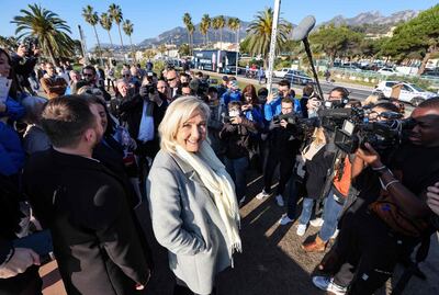 French far-right Rassemblement National party presidential candidate Marine Le Pen visits a local market in Menton, south-eastern France, on February 12. AFP