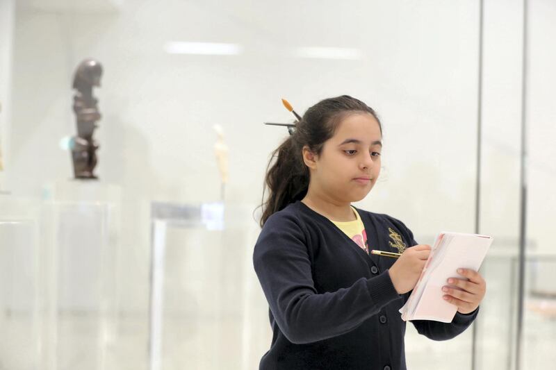 Abu Dhabi, United Arab Emirates - December 04, 2019: Miriam aged 9 from Repton School, Abu Dhabi. The Young Guides programme sees school children from across the UAE take part in a 6-week long programme to learn about a select group of objects from the museumÕs permanent collection and receive special training from Louvre AbuDhabiÕs Education team, who teach them how to present and educate a museum-going audience about artistic objects. Wednesday, December 4th, 2019. Louvre, Abu Dhabi. Chris Whiteoak / The National