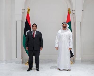 ABU DHABI, UNITED ARAB EMIRATES - June 05, 2021: HH Sheikh Mohamed bin Zayed Al Nahyan, Crown Prince of Abu Dhabi and Deputy Supreme Commander of the UAE Armed Forces (R) stands for a photograph with HE Dr Mohamed Younis Al Manfi, President of the Presidential Council of Libya (L), at Al Shati Palace.

( Mohamed Al Hammadi / Ministry of Presidential Affairs )
---