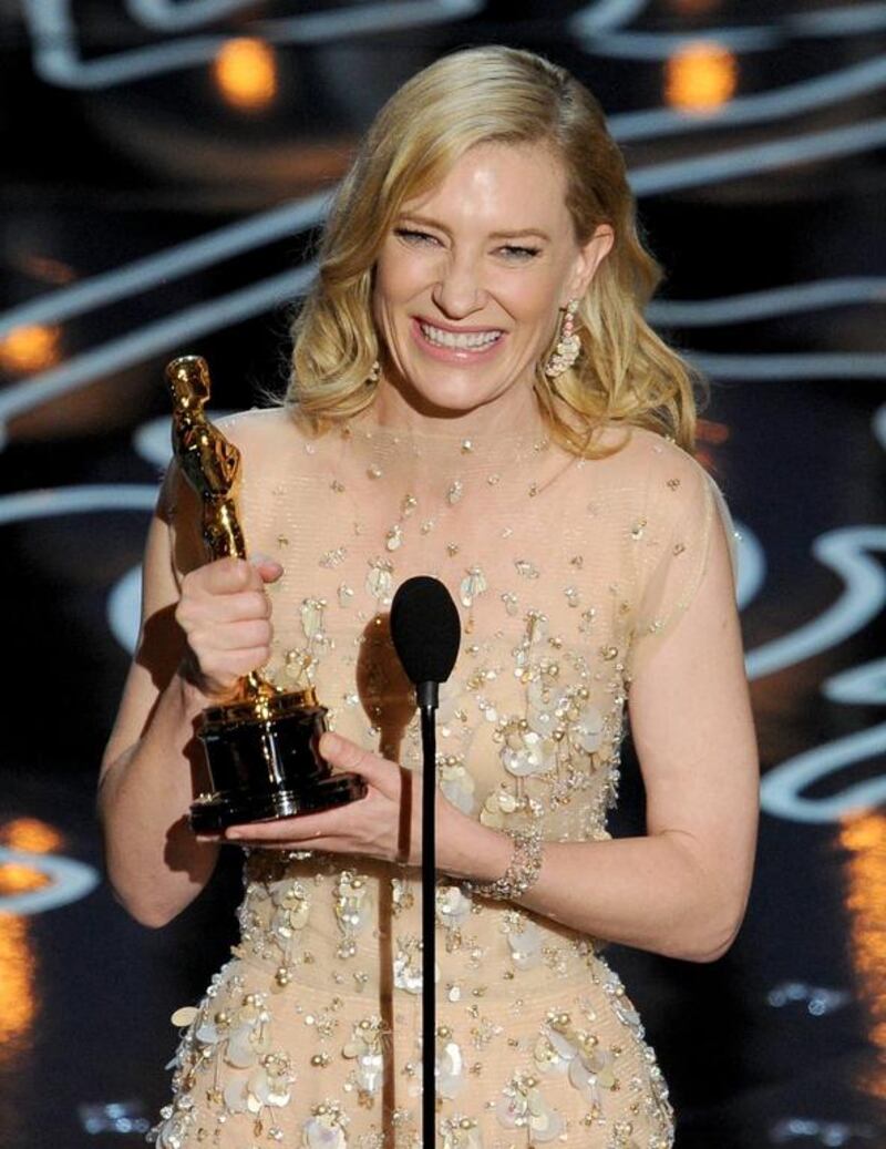 Actress Cate Blanchett accepts the Best Performance by an Actress in a Leading Role award for Blue Jasmine. AFP

