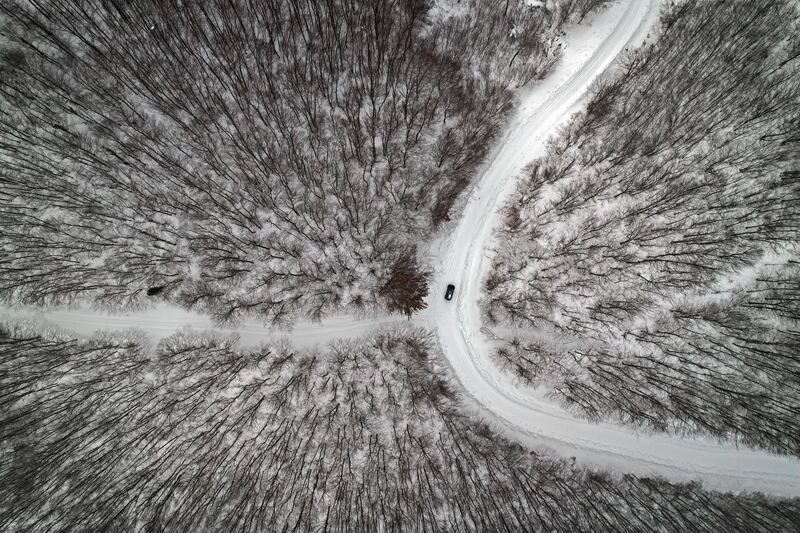 Snow covered roads amid the forests of Navarra, northern Spain, after snowfall. EPA